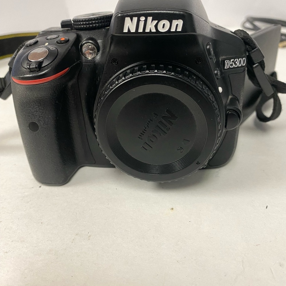 Nikon D5300 Camera Body w strap and 3 lenses 4 batt  carry bag